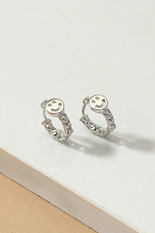 Happy face huggie hoop earrings