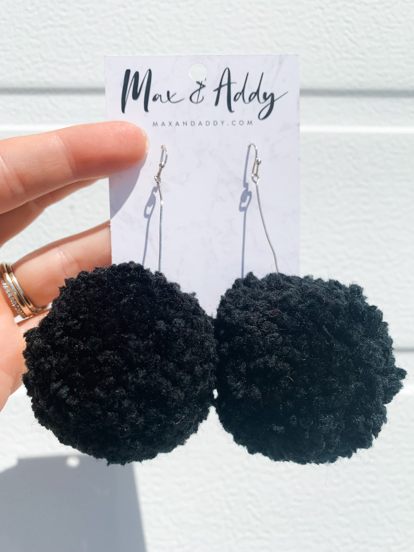 Large Pom Pom Earrings in Black