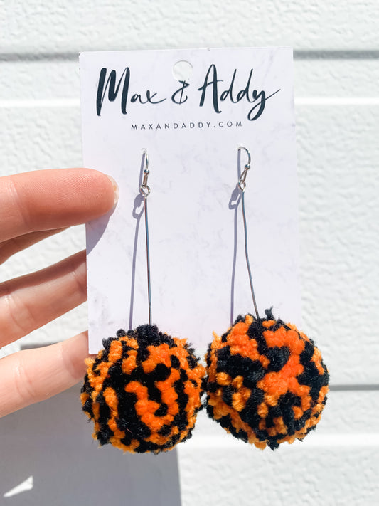 Small Pom Pom Earrings in Orange/Black